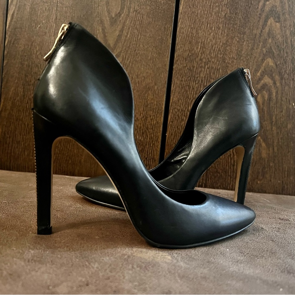 BCBGeneration Black Heels with zipper accent.